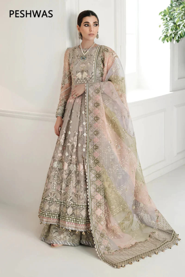 Net dupatta and embroidered palazzo trousers.