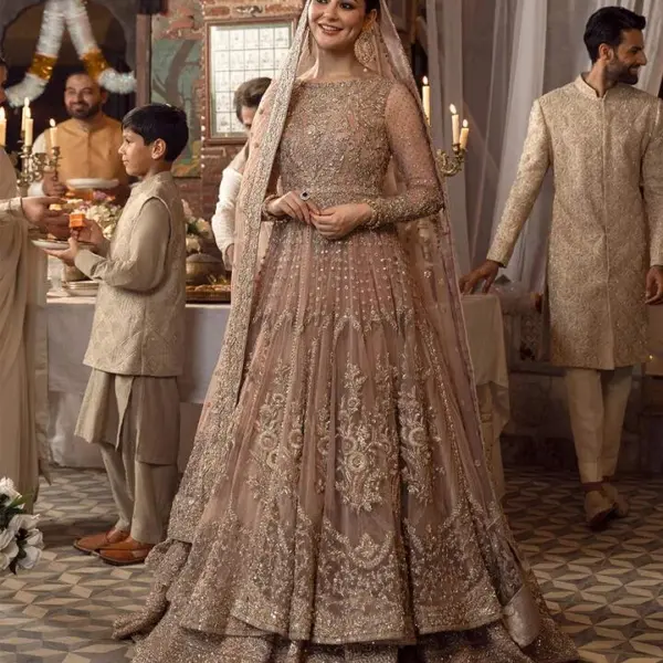 Embroidered Gold Lehenga And Maxi Outfit For Pakistani Bridal